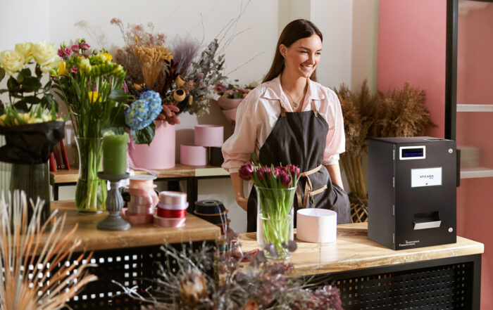 Imagen de comercio de flores con AT CASH